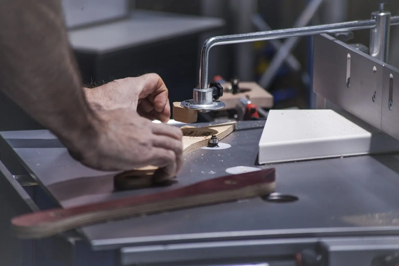 Multiple handyman website designs displayed on laptop and mobile devices — 12 best handyman website examples analyzed by Journela for 2026